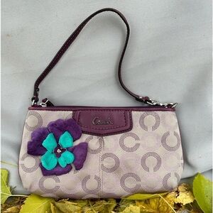 Coach Wristlet with suede flowers. Upstyled for a fresh new look. 9.25x5.5 x1”